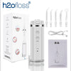 A white portable water flosser device and various tips are shown in a product box context.