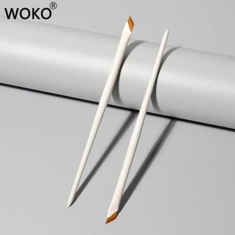 A set of precision eyeliner application brushes shown against a light gray background.