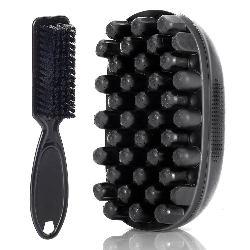 A black silicone brush with multiple bristles and a black plastic comb are shown on a white background.
