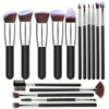 A collection of professional makeup brushes in various sizes and shapes, including foundation, powder, and blending brushes.