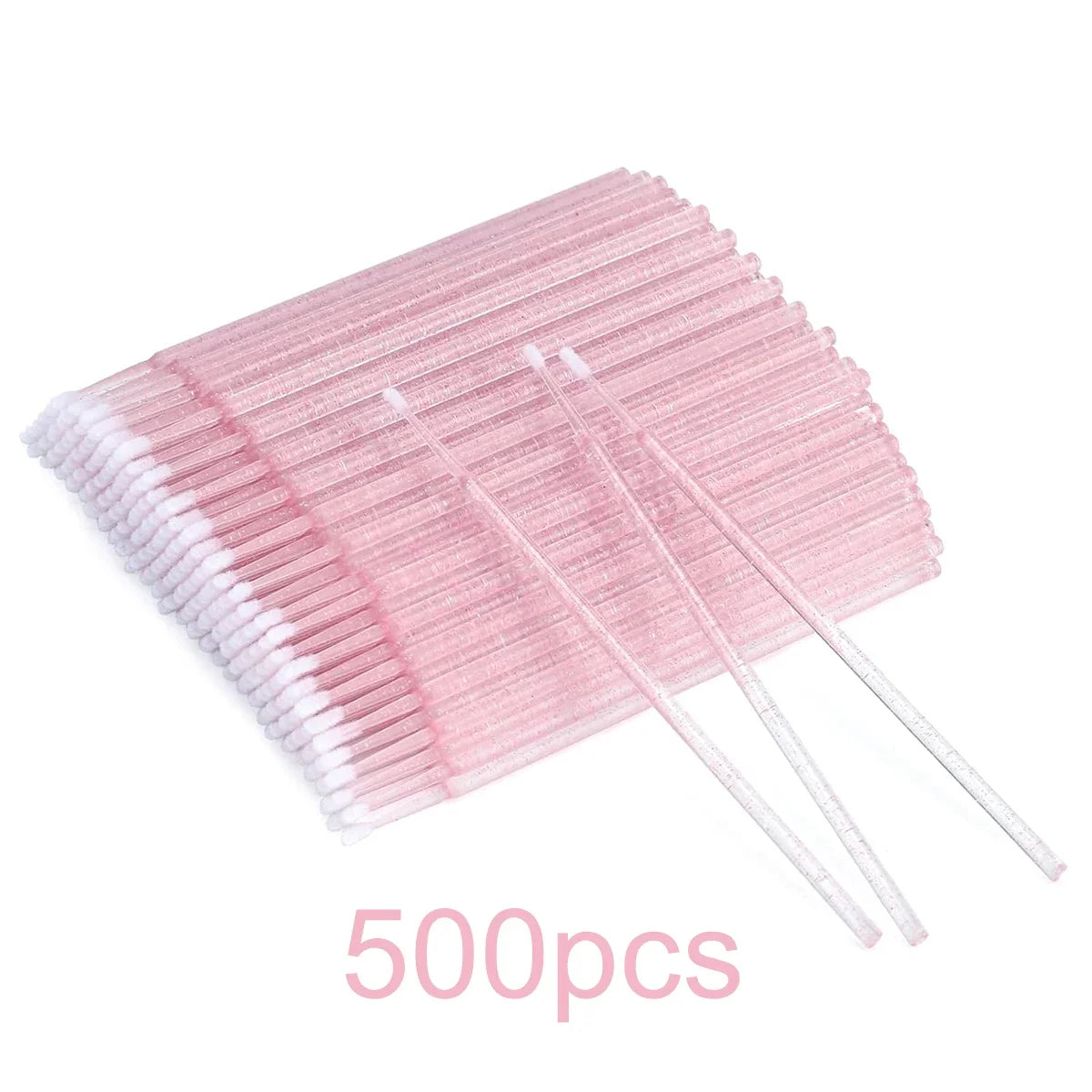 Brosse en silicone rose plate avec de nombreuses fines poils et trois applicateurs individuels sur fond blanc.