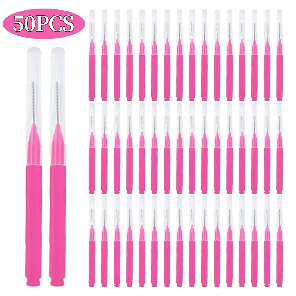 A set of 50 mini brow and eyelash combs in pink and clear plastic.