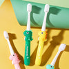 A collection of colorful cartoon dinosaur toothbrushes for kids displayed on a yellow background.