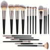 A collection of various makeup brushes including foundation, powder, and blending brushes.