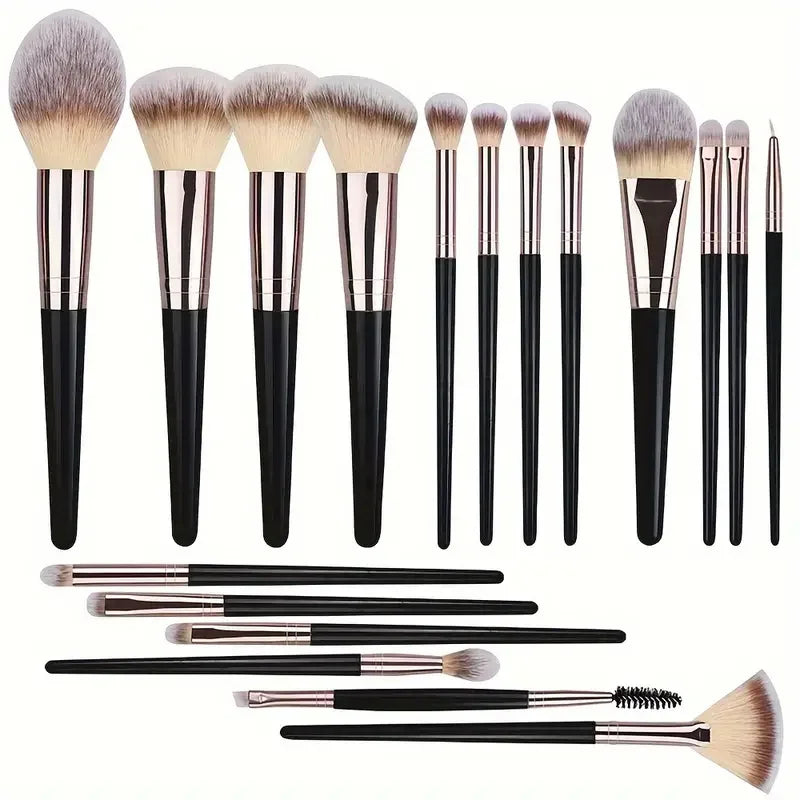 A collection of various makeup brushes including foundation, powder, and blending brushes.