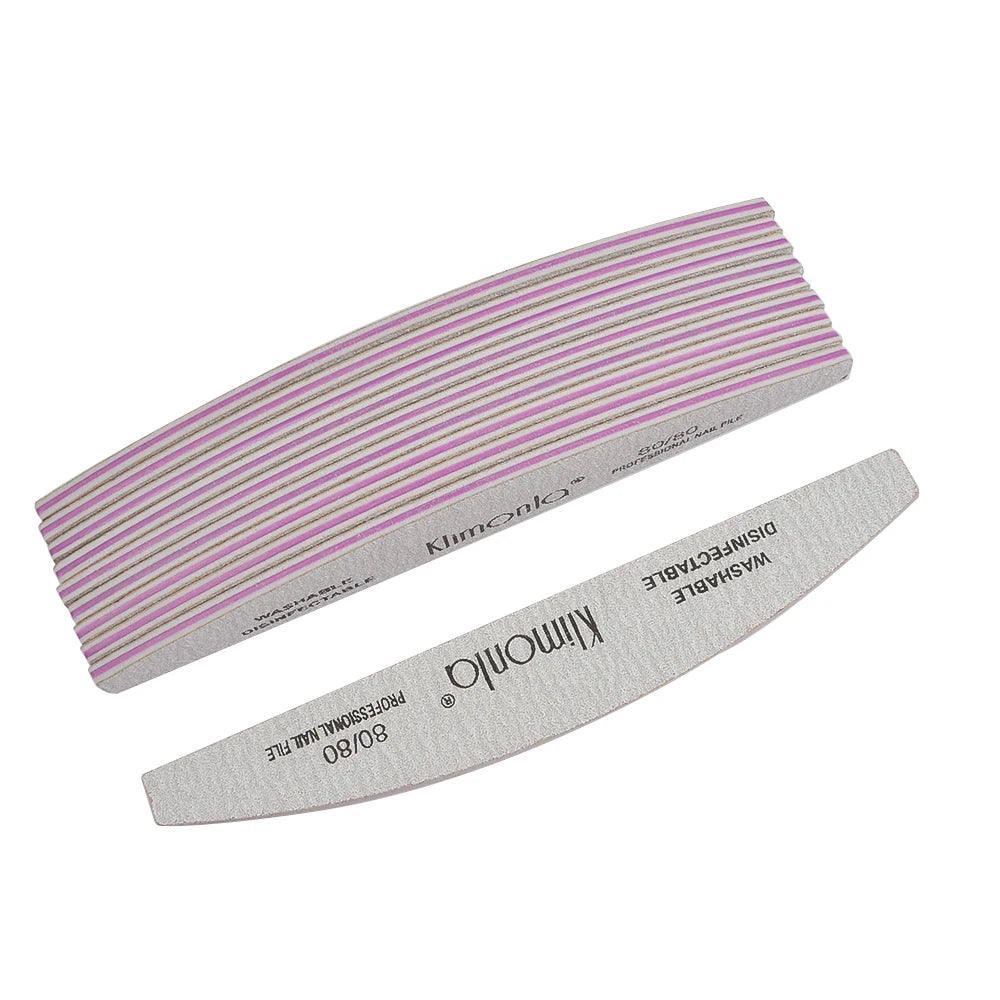 A set of pink and white striped disposable washable professional nail files for manicure and pedicure.