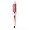 A pink professional heated curling iron brush with red ceramic bristles and a black base.