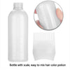 A white bottle with a scale and a fine-tooth comb applicator for mixing hair color potion.