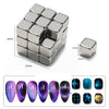 A set of silver nail magnet wands and various colored nail art tips for 3D nail art
