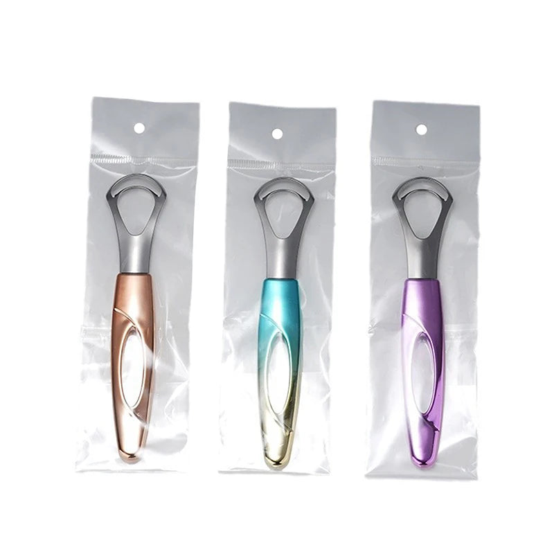 Tres raspadores de lengua de acero inoxidable en oro rosa, verde azulado y morado, empaquetados en plástico transparente.