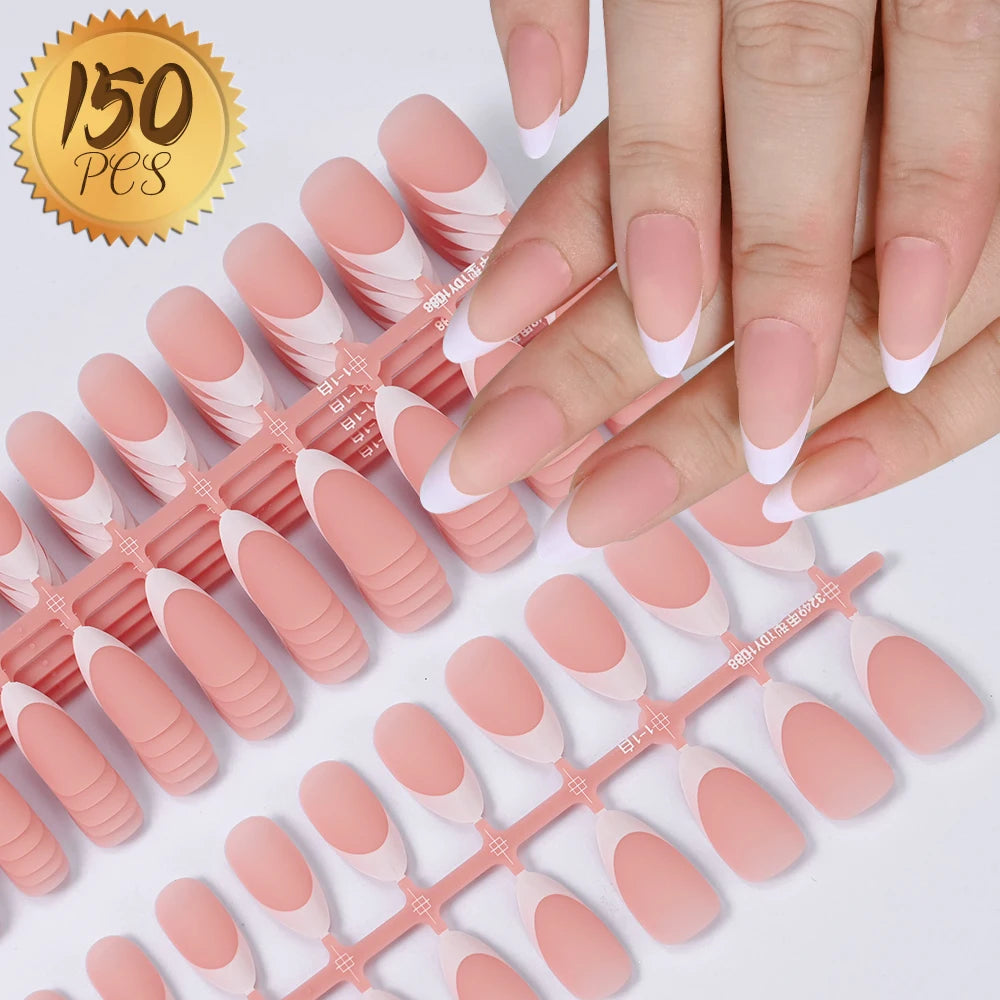 A set of matte pink French press on artificial fingernails displayed on a hand.