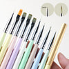 A collection of professional nail art brushes in various pastel colors and shades, shown alongside a size reference.