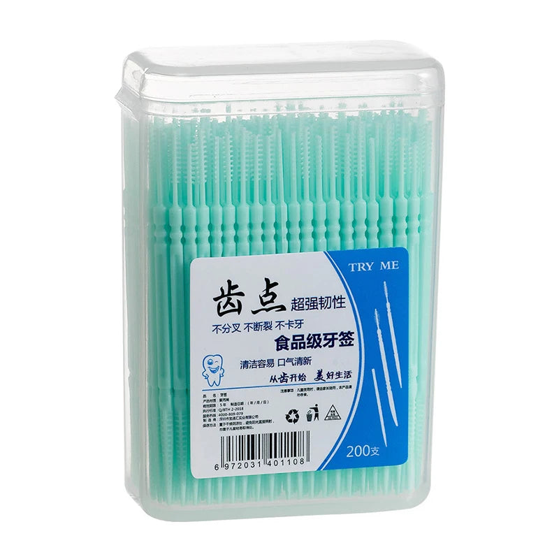 Contenedor de plástico transparente con hilo dental de silicona verde claro para higiene bucal.