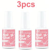 Three bottles of Mischeering Nail Glue brush-on product in pink packaging