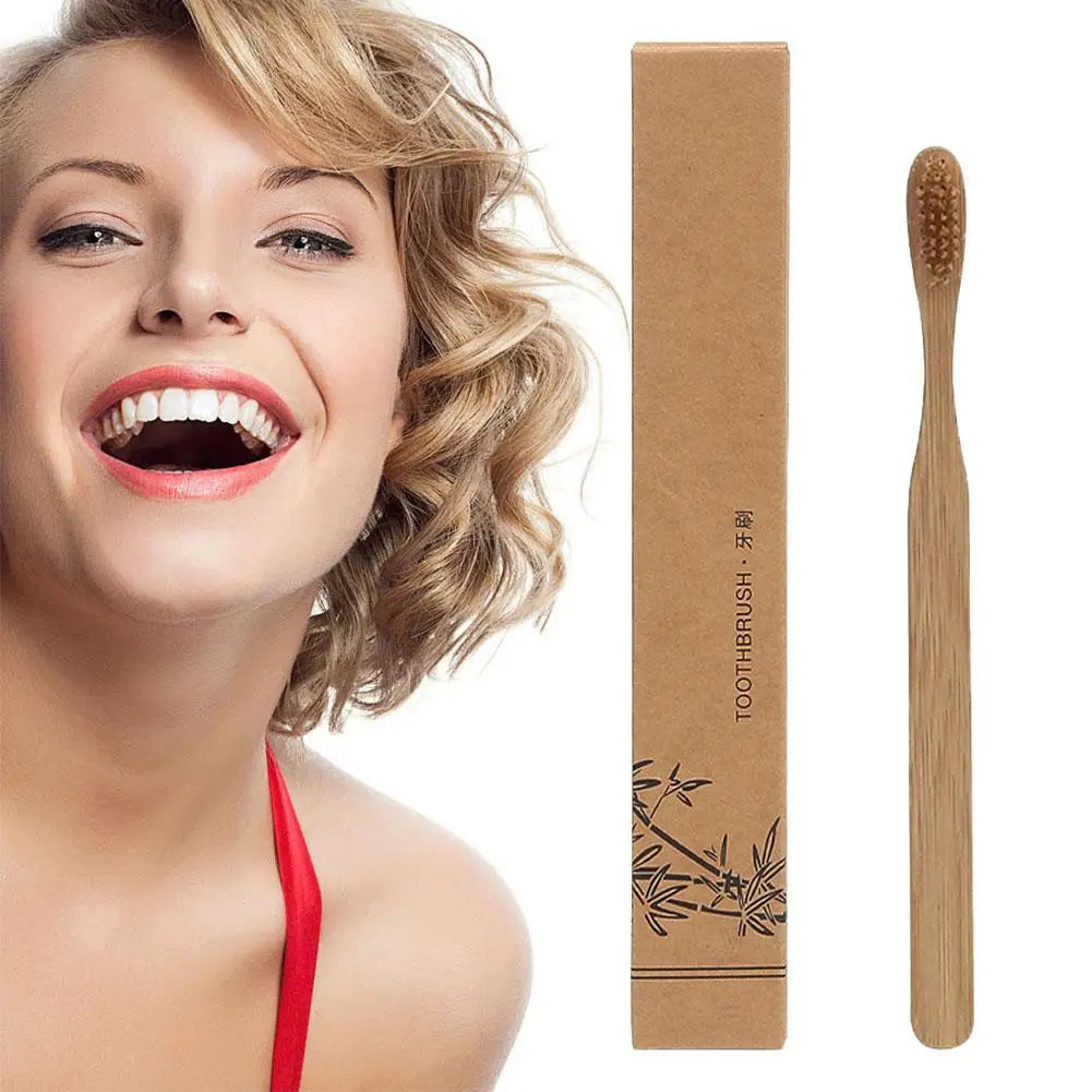 A woman smiling while holding an eco-friendly disposable bamboo toothbrush set in a brown cardboard box.