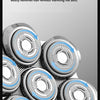 Close-up view of multiple interchangeable electric shaver heads with floating blades.