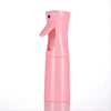 A pink 200ml continuous fine mist spray bottle for hair and wigs.