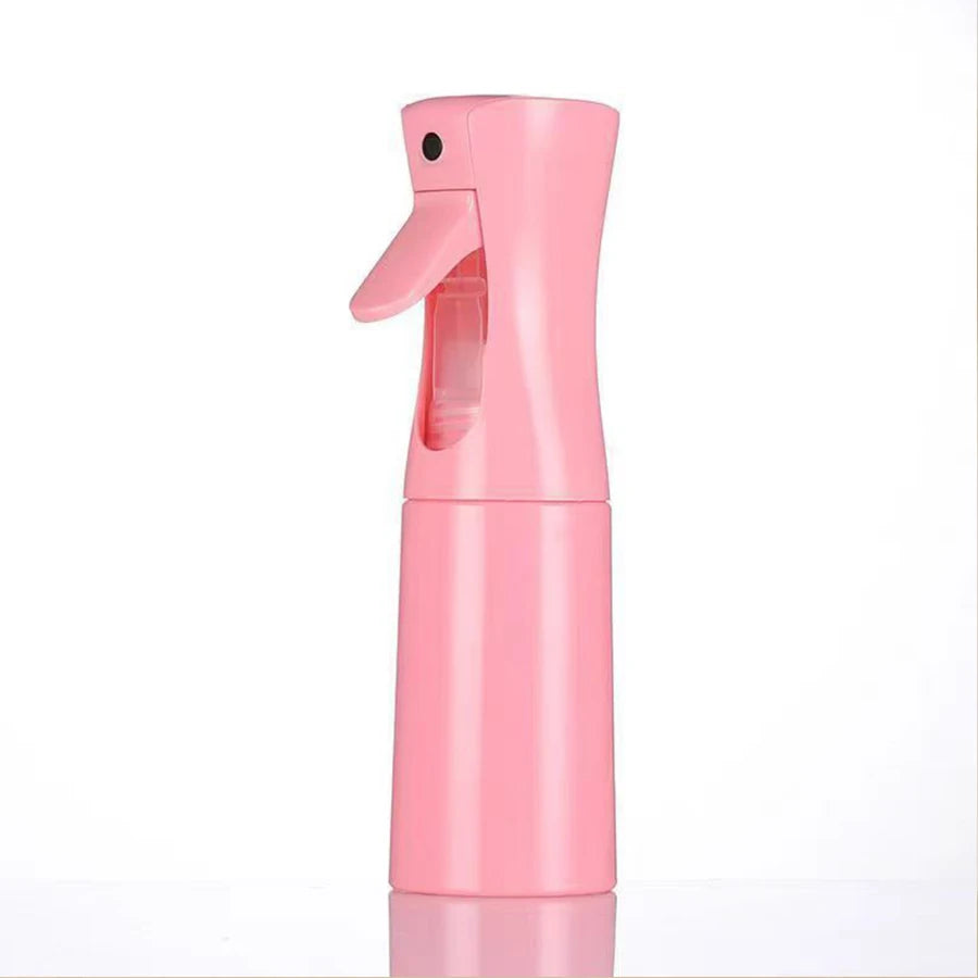A pink 200ml continuous fine mist spray bottle for hair and wigs.