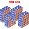 A stack of 100 double-sided safety stainless steel razor blades packaged in blue and brown cardboard boxes.