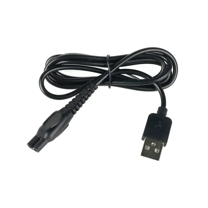 Adaptateur de charge électrique universel noir avec cordon enroulé et connecteur USB.
