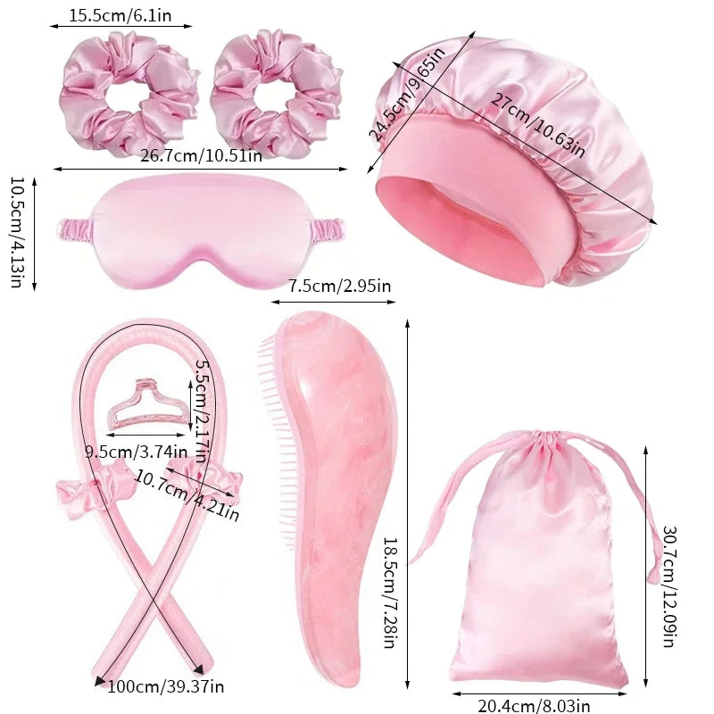 Un ensemble d'outils de coiffure en silicone rose, comprenant des rouleaux, un coussinet en silicone et un accessoire pour ch