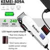 White Kemei-809A rechargeable hair clipper with an LCD display and Li-ion battery.