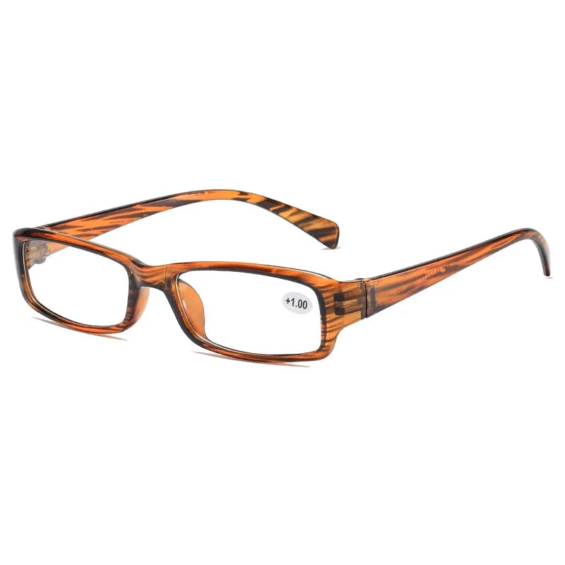 A pair of tortoiseshell-framed reading glasses with clear lenses and gold accents.