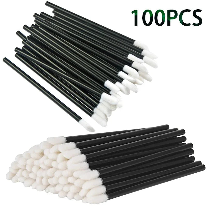 A set of 100 precision makeup brushes with black handles and white bristles.
