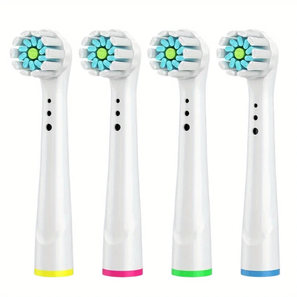 Three white replacement toothbrush heads for electric toothbrushes shown side by side.