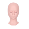 A realistic silicone mannequin head used for practicing eyelash extensions.