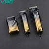 Set professioneller Haarschneider und Trimmer mit Gold- und Schwarz-Finish vor dunklem Hintergrund.