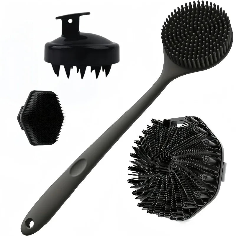 A set of black silicone bath and body scrub brushes including a handheld brush and two exfoliating facial brushes.