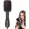 A black heat styling tool with a pink grille is shown next to a woman using it on her hair.
