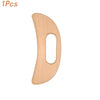 A natural wood Gua Sha roller shaped like the letter D for facial massage and detox.