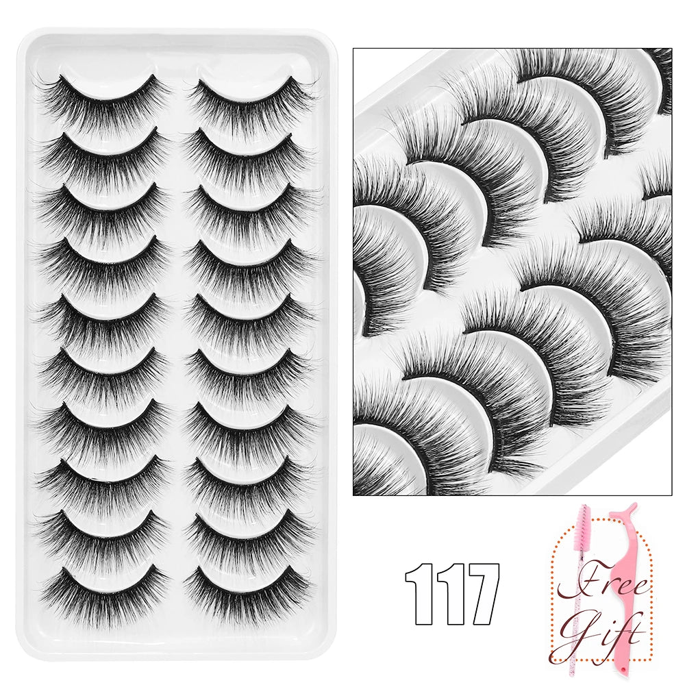 Eine Plastikschale mit 117 Paaren dramatischer Mink-Falschelashs und einer Nahaufnahme-Illustration.