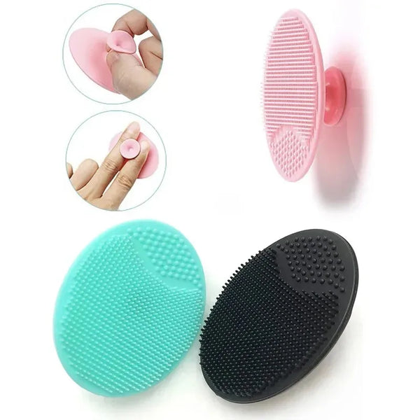 A silicone facial cleansing brush shown in various angles, including a pink and a teal color.