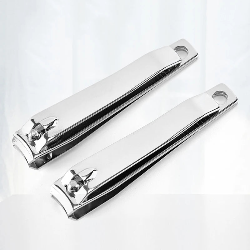 A pair of shiny stainless steel nail clippers for fingernails and toenails.