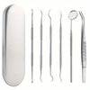 A set of professional multi-tool tooth cleaning instruments including various dental tools and a cleaning scoop.