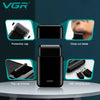 A black VGR beard shaver and trimmer device shown with various components like a protection cap, close cut blade, pop-up trim