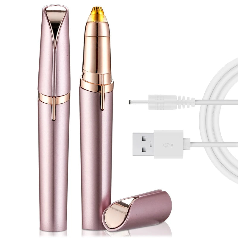 A pink precision electric eyebrow trimmer with a gold-tipped nose and charging cable.