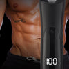 A black electric man trimmer device is shown next to a muscular torso.