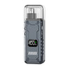 A close-up view of a gray electric trimmer device with a silver cap and a digital display showing 100% battery.