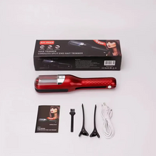 A box and components for a professional cordless hair trimmer used to cut split ends.