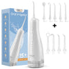 A white momwell oral irrigator device shown with various tips and accessories.