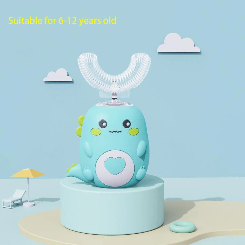 A light blue electric toothbrush with a cartoon face and U-shaped head is displayed on a stand.