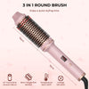 A pink 3 in 1 round brush with a ceramic barrel and bristles shown diagonally.