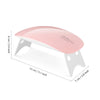 A pink SUNmini professional nail care kit featuring an electric drill and UV LED lamp.