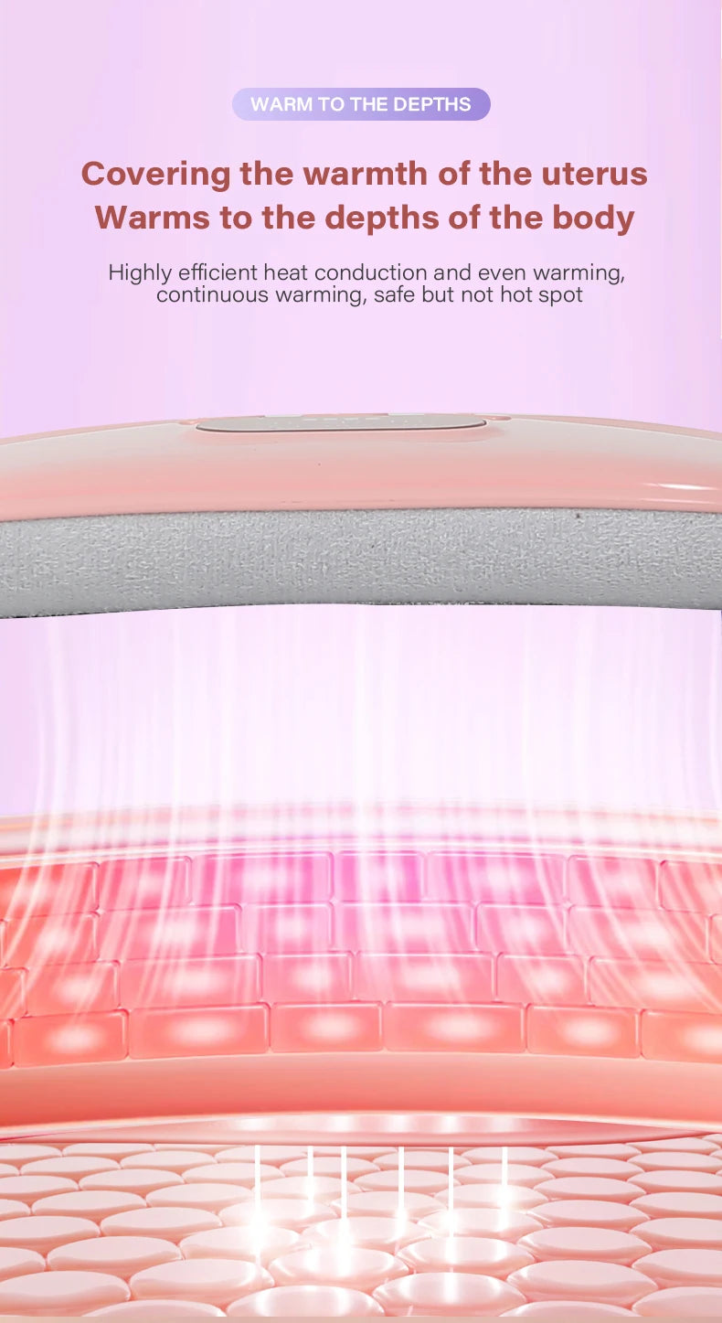 A close-up of a pink heated abdominal massage belt being used on the lower abdomen.