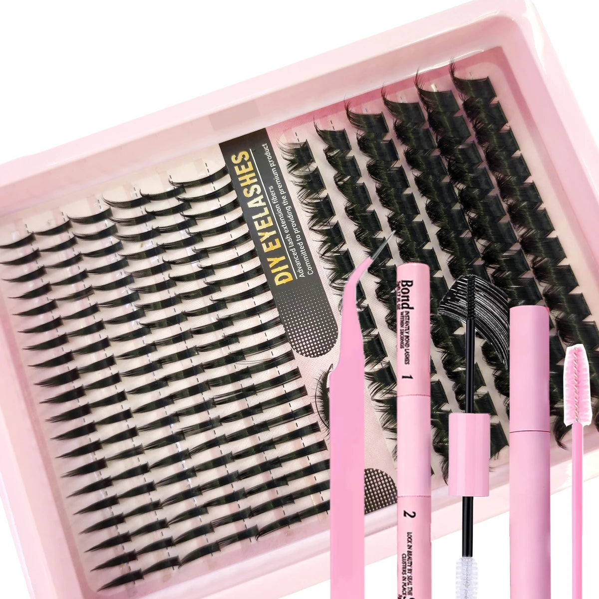A pink tray holds a DIY lash extension kit with black false lashes and pink tools for salon use