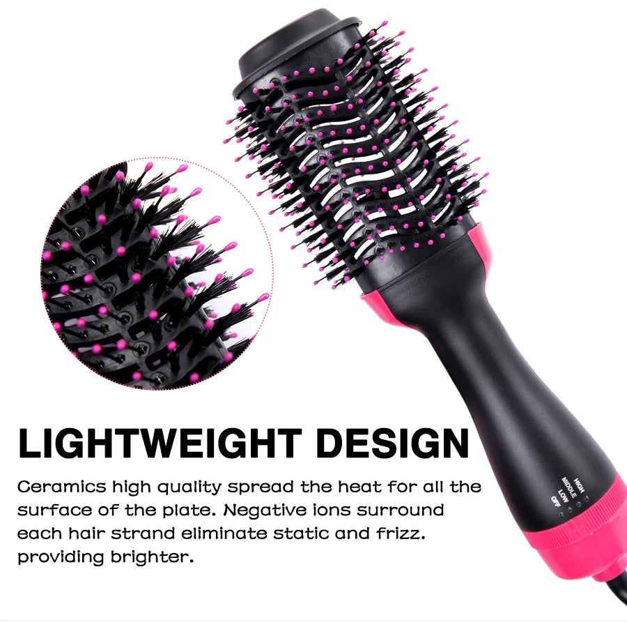 Black hair dryer brush with pink accents showing a close-up of the bristles and design features